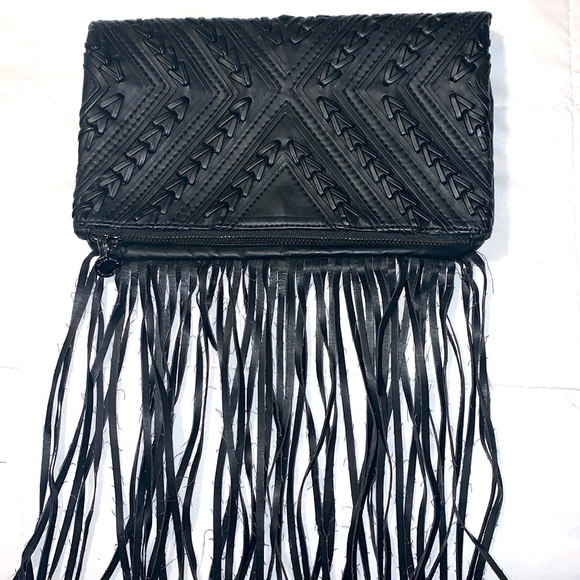 BCBGeneration black clutch bag. Snaps closed hanging leather strings. 2 zippers - Picture 2 of 9